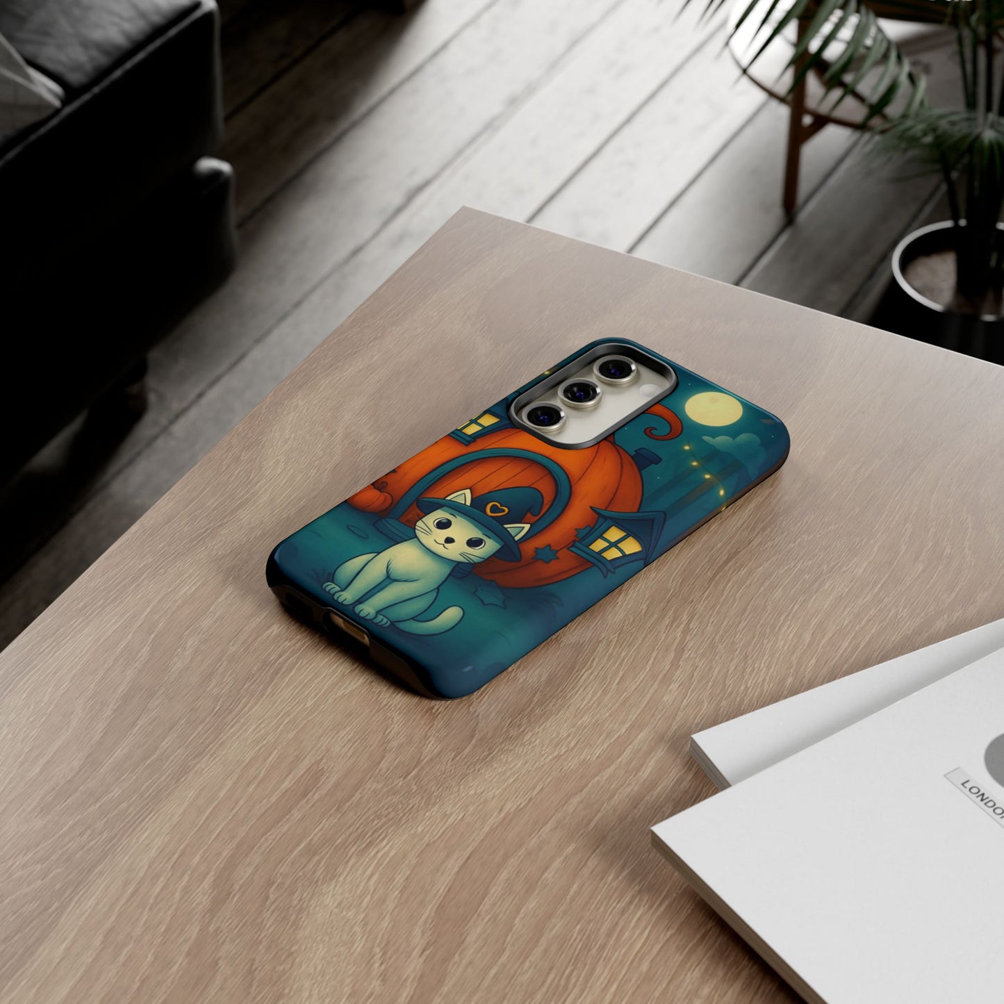 Spooky Halloween Cat Phone Case with Witch Hat and Pumpkin Design for iPhone and Android